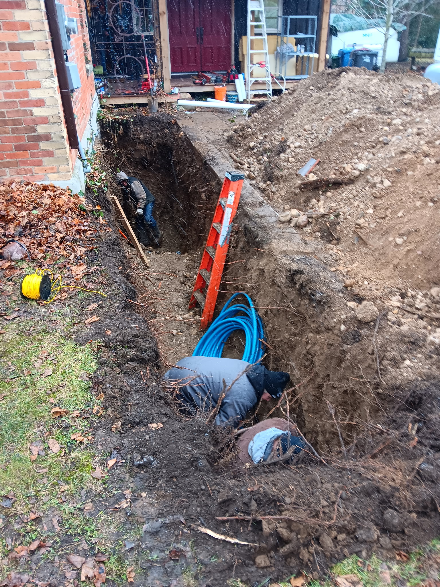 Septic service work underway at a residential property